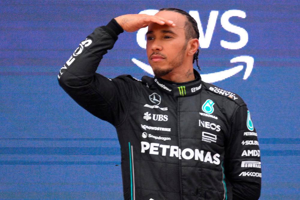 Second placed Mercedes’ British driver Lewis Hamilton gestures on the podium after the Spanish Formula One Grand Prix race at the Circuit de Catalunya on June 4, 2023 in Montmelo, on the outskirts of Barcelona/AFPpix