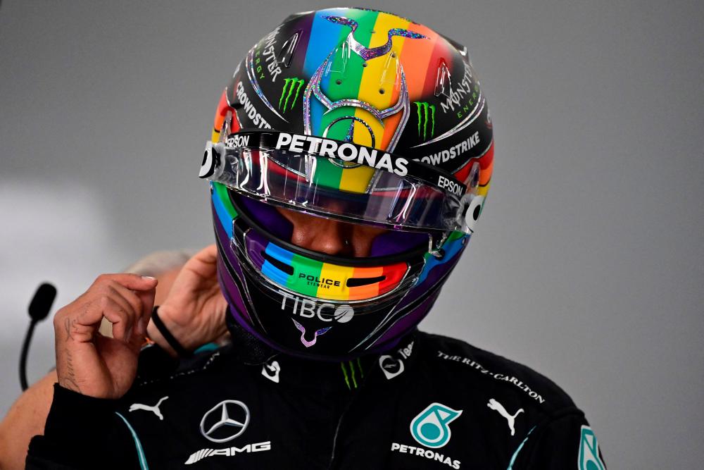 Mercedes' British driver Lewis Hamilton wears a rainbow helmet during practice sessions of the Saudi Arabian Grand Prix at the Jeddah Corniche Circuit in Jeddah on December 3, 2021. AFPpix