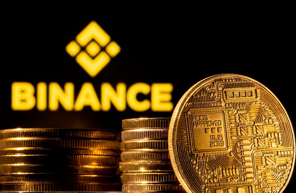 A representation of cryptocurrency is seen in front of Binance logo in this illustration taken, March 4, 2022. REUTERSPIX