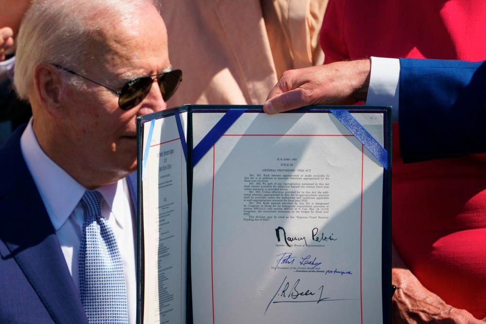 HR 4346, the Chips and Science Act of 2022, is displayed after it was signed by US President Joe Biden in the White House in Washington DC on Aug 9. – AFPpix