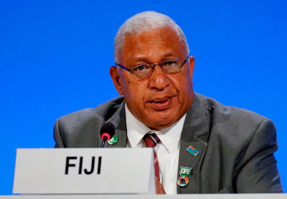 Fiji’s Prime Minister Josaia Voreqe ‘Frank’ Bainimarama attends a meeting during the UN Climate Change Conference (COP26) in Glasgow, Scotland, Britain, November 2, 2021. REUTERSpix