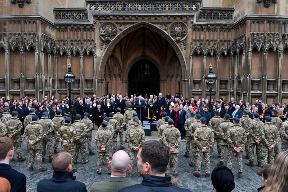 British Prime Minister Boris Johnson speaks at an event to thank the UK armed forces for their role in the Afghanistan evacuation operation earlier this year, in London, Britain, November 24, 2021. UK Parliament/Jessica Taylor/Handout via REUTERSpix