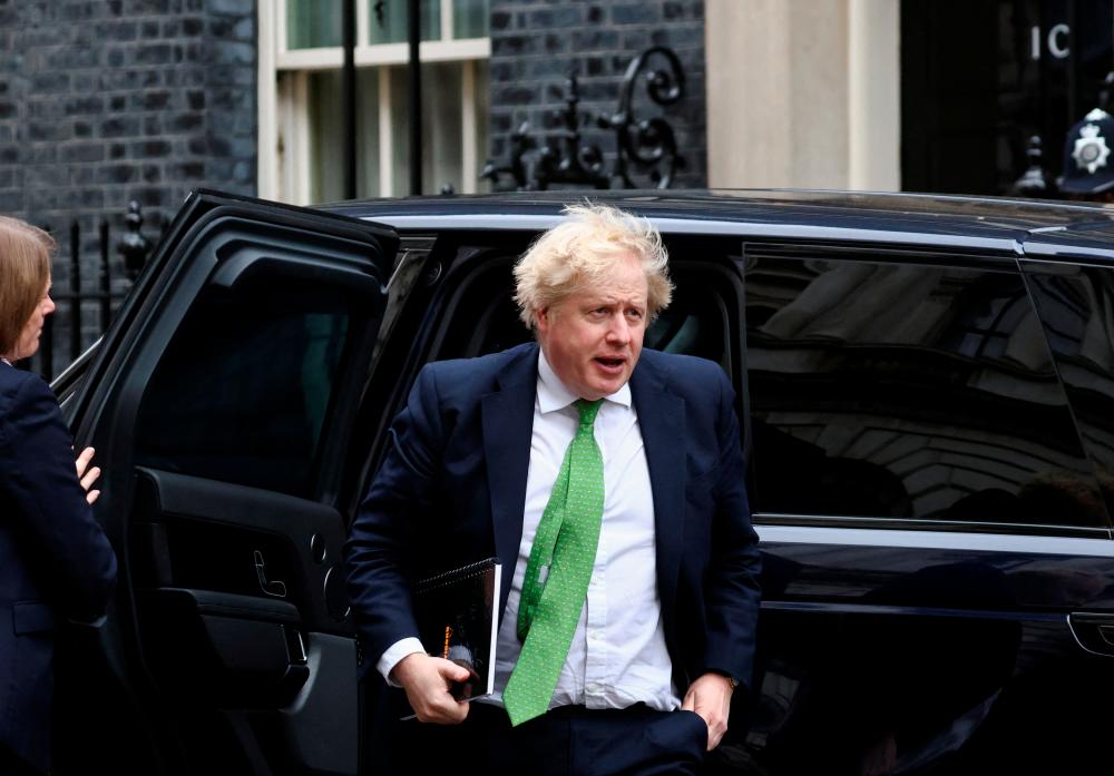 File photo: British Prime Minister Boris Johnson arrives at Downing Street, in London, Britain February 22, 2022. REUTERSpix