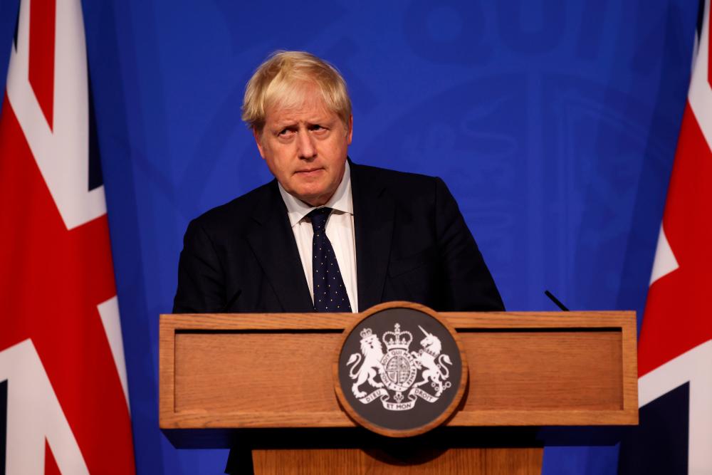 File photo: Britain's Prime Minister Boris Johnson looks on during a news conference on the coronavirus disease (Covid-19) in the Downing Street Briefing Room, London, Britain September 14, 2021. Dan Kitwood/Pool via REUTERSpix