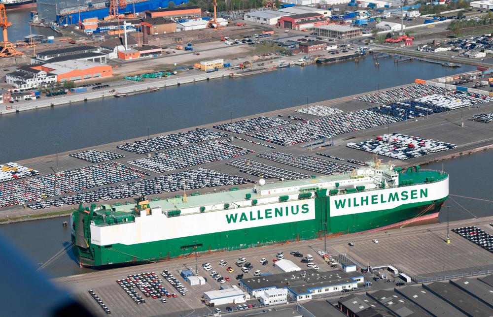 Cars intended for export wait at the port for loading in Bremerhaven, Germany, in April 2020. – Reuters– Reuterspix