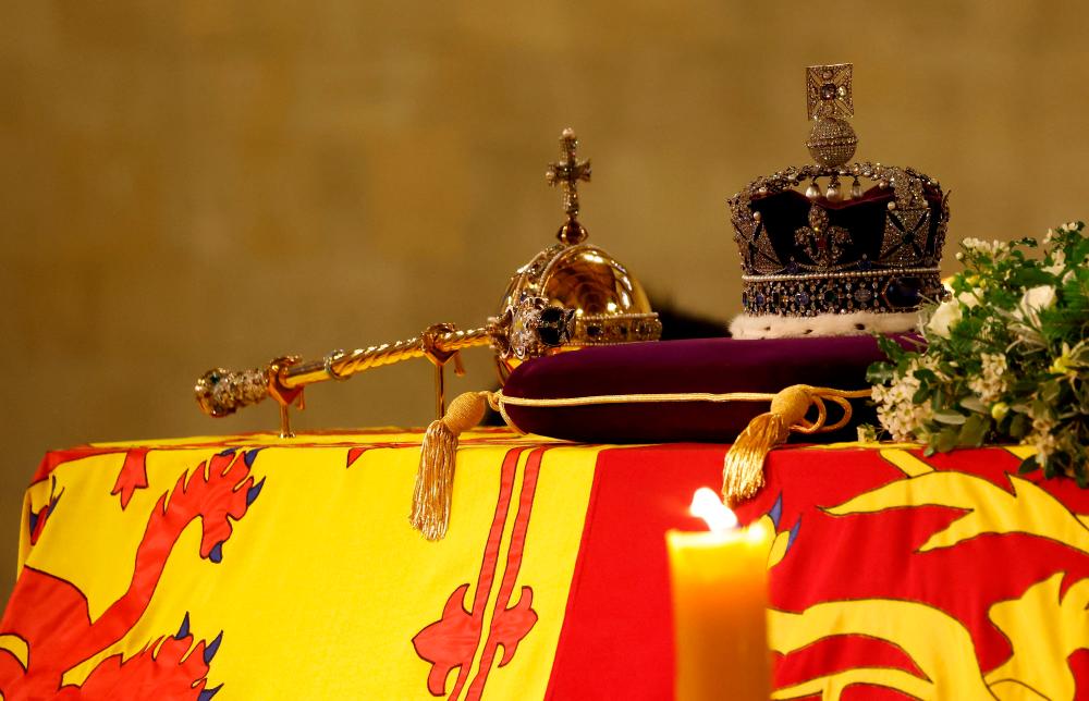 The Imperial State Crown lays atop the coffin of Queen Elizabeth II as it Lies in State inside Westminster Hall, at the Palace of Westminster in London on September 15, 2022. AFPPIX