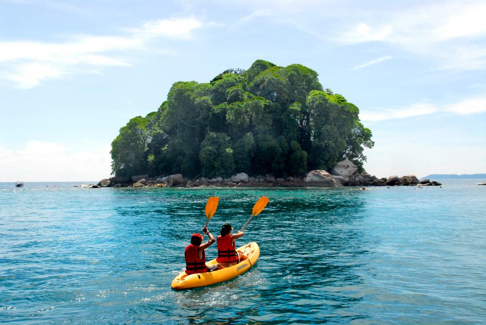 $!Enjoy a host of water activities provided by the resort, including kayaking on the open sea.