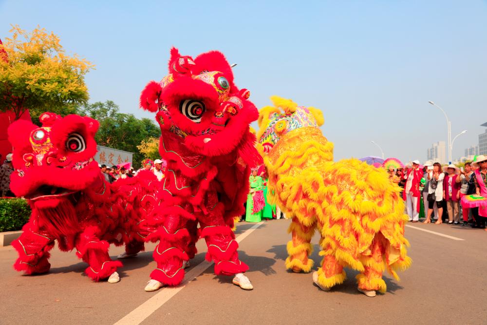 $!Traditional lion dances are believed to chase off evil spirits.