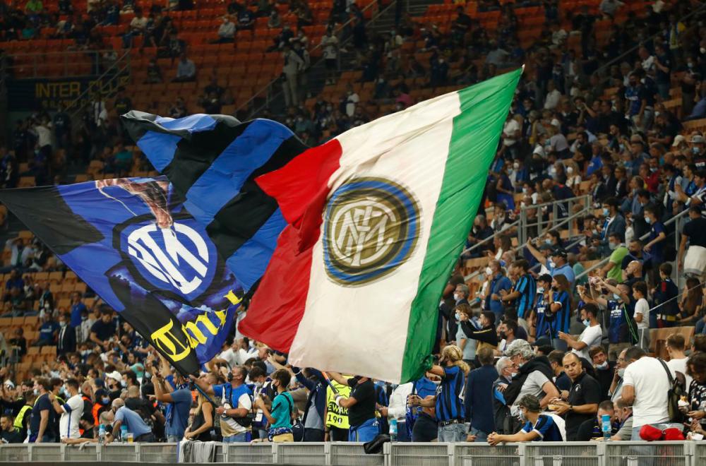 Soccer Football - Champions League - Group D - Inter Milan v Real Madrid - San Siro, Milan, Italy - September 15, 2021 Inter Milan fans waving flags inside the stadium before the match REUTERSPIX