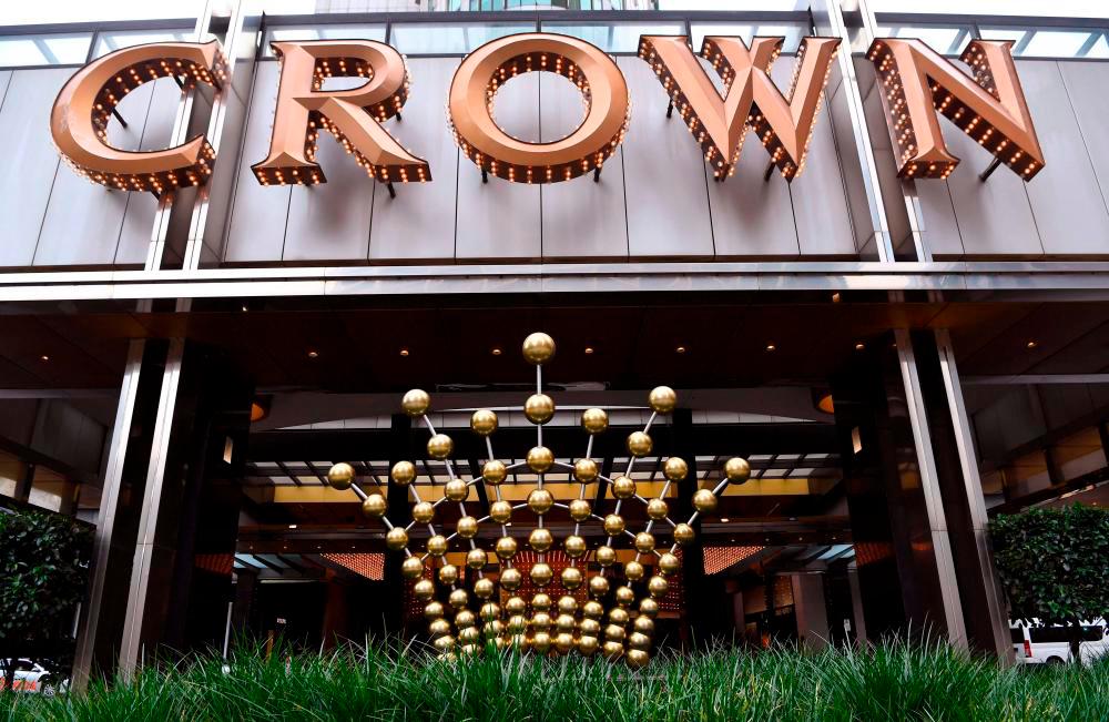 Filepix: Signage adorns the side of the Crown Casino in Melbourne/AFPPix
