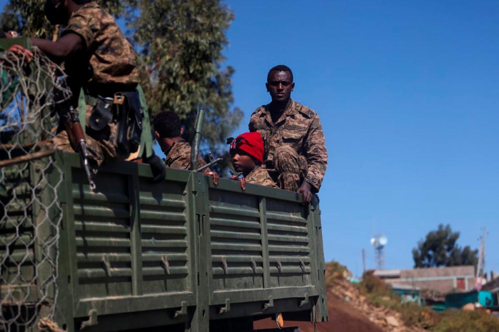 Ethiopian soldiers ride on a truck near the town of Adigrat, Tigray region, Ethiopia, March 18, 2021. REUTERSPIX