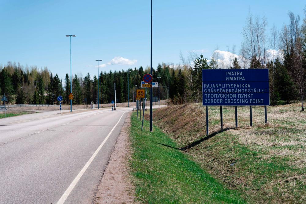 A street sign announces the Finnish-Russian Imatra border crossing, in Imatra, south-eastern Finland, on May 13, 2022. For many Finns living on the border to their eastern neighbour, signs of Finland applying to join NATO have been welcomed with relief. - AFPpix