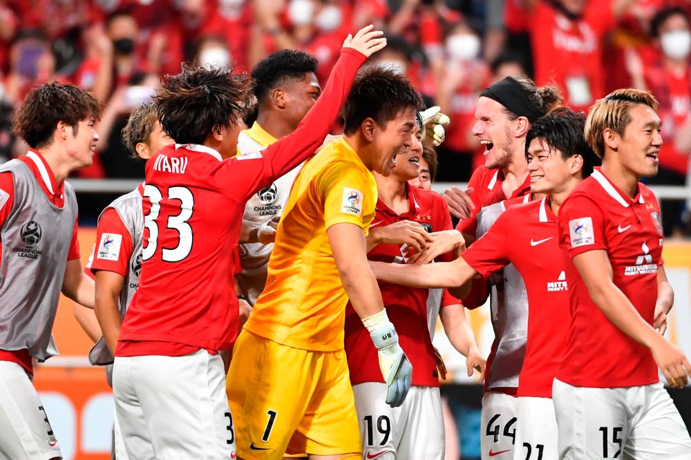 affjedring frill atlet Japan's Urawa win penalty thriller to reach AFC final