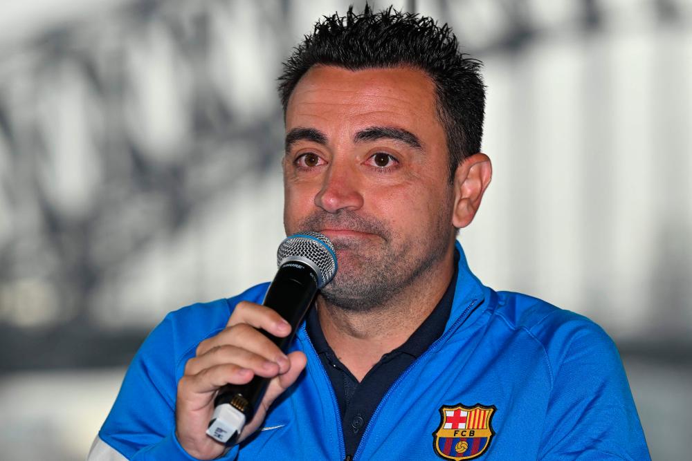 FC Barcelona head coach Xavi Hernandez speaks at a press conference in Sydney on May 24, 2022, on the eve of their friendly match against A-League All Stars. AFPPIX