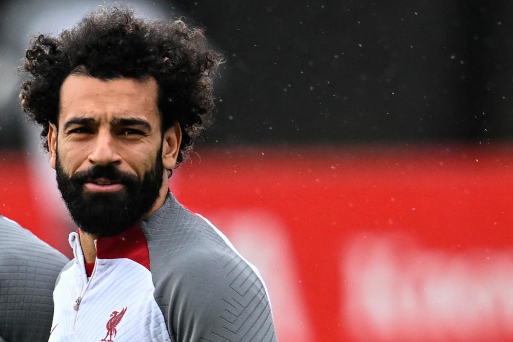 Liverpool’s Egyptian striker Mohamed Salah takes part in a training session at Liverpool training ground in Liverpool, northwest England, on March 14, 2023, on the eve of their UEFA Champions League round of 16 last second-leg football match against Real Madrid/AFPPix