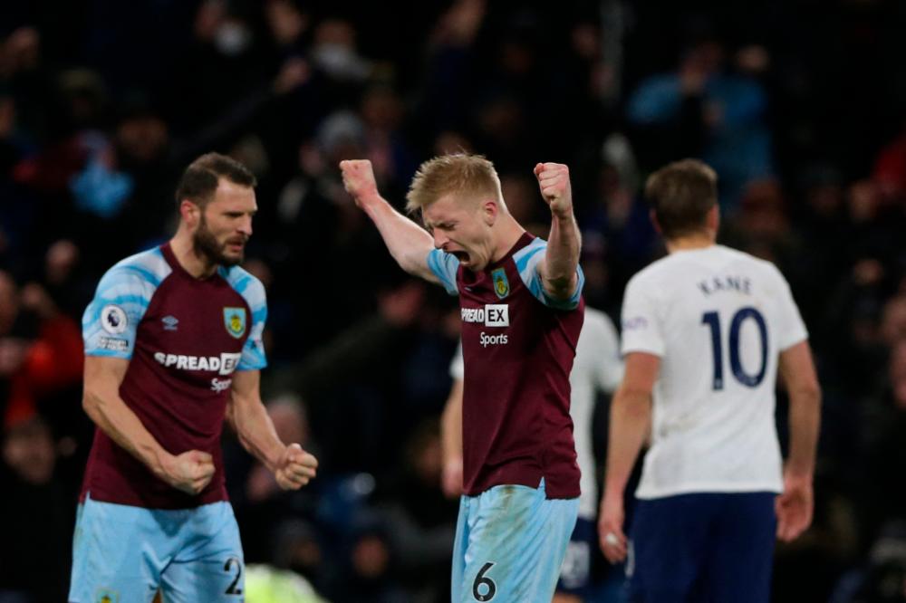 Burnley’s English defender Ben Mee (C) celebrates at the end of the English Premier League football match between Burnley and Tottenham at Turf Moor in Burnley, north west England on February 23, 2022. AFPPIX