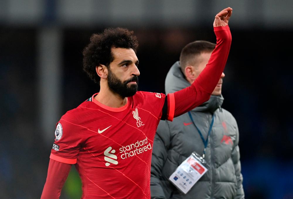 Liverpool's Egyptian midfielder Mohamed Salah waves to the fans after the English Premier League football match between Everton and Liverpool at Goodison Park in Liverpool, north west England on December 1, 2021. AFPpix