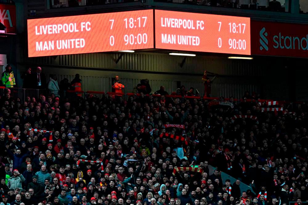The scoreboard shows the final score, 7-0 after the English Premier League football match between Liverpool and Manchester United at Anfield in Liverpool, north west England on March 5, 2023. Liverpool won the game 7-0. AFPPIX