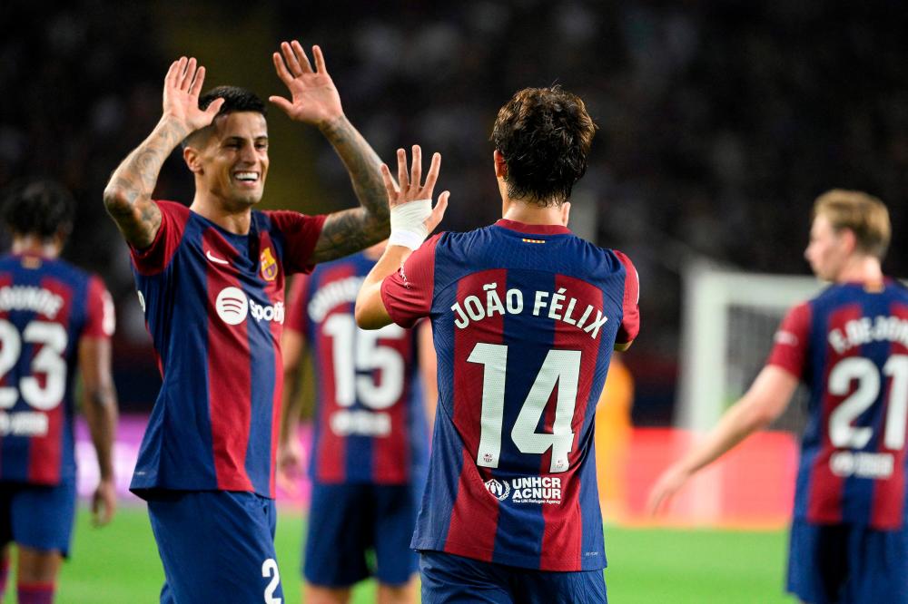 Felix and Cancelo strike in Barca demolition of Betis