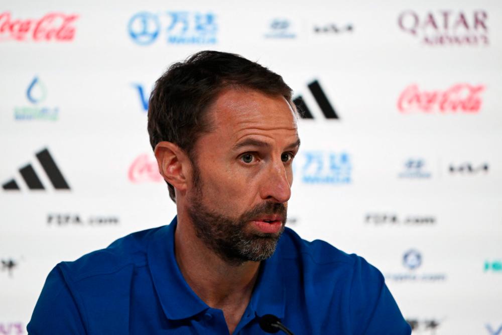 England’s coach Gareth Southgate addresses a press conference at the Qatar National Convention Center (QNCC) in Doha on November 24, 2022, on the eve of the Qatar 2022 World Cup football match between England and USA. AFPPIX