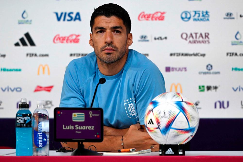Uruguay’s forward #09 Luis Suarez gives a press conference at the Qatar National Convention Center (QNCC) in Doha on December 1, 2022, on the eve of the Qatar 2022 World Cup football match between Ghana and Uruguay/AFPPix