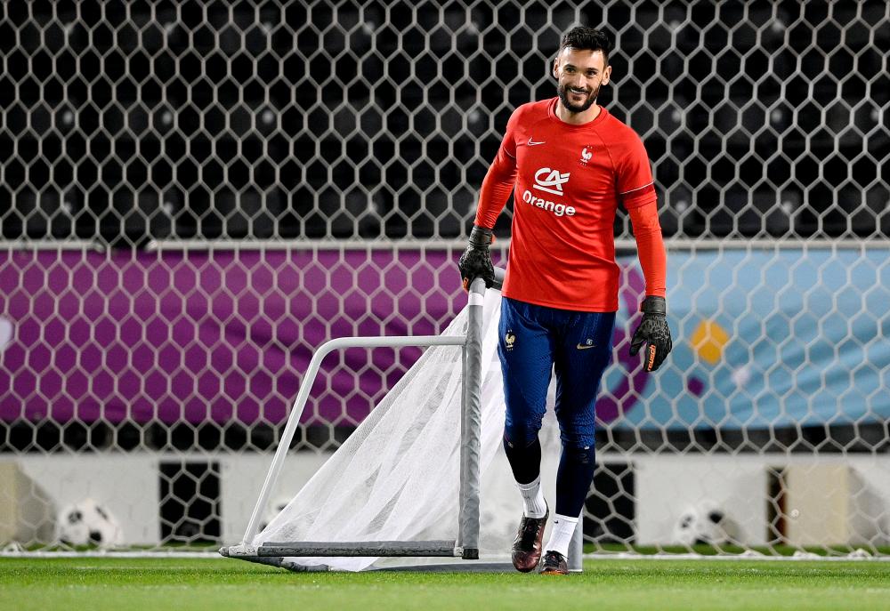 France’s goalkeeper #01 Hugo Lloris takes part in a training session at the Al Sadd SC training center in Doha, on December 8, 2022, in the build-up to the Qatar 2022 World Cup quarter final football match between France and England. AFPPIX