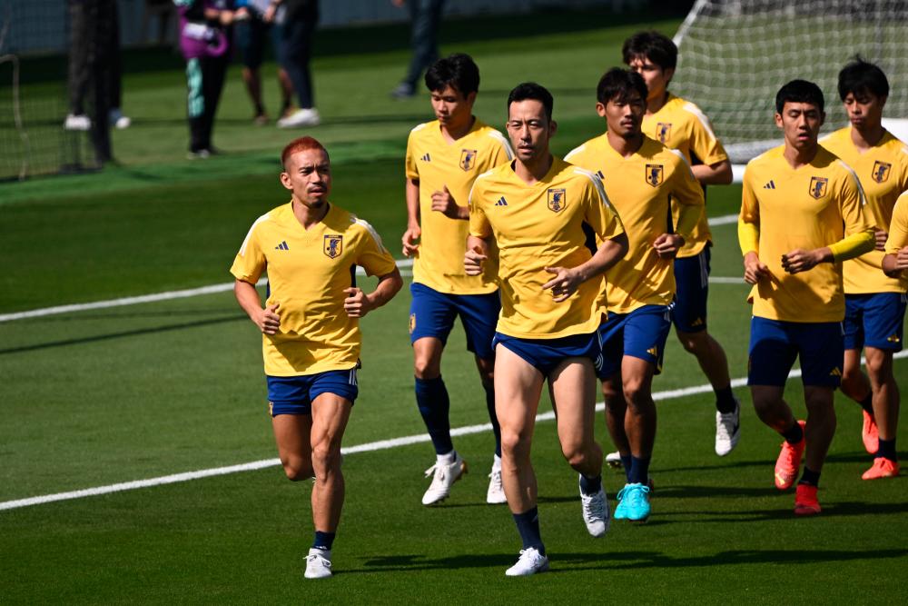Japan’s players take part in a training session at Al Sadd SC in Doha on November 26, 2022, on the eve of the Qatar 2022 World Cup football match between Japan and Costa Rica. AFPPIX
