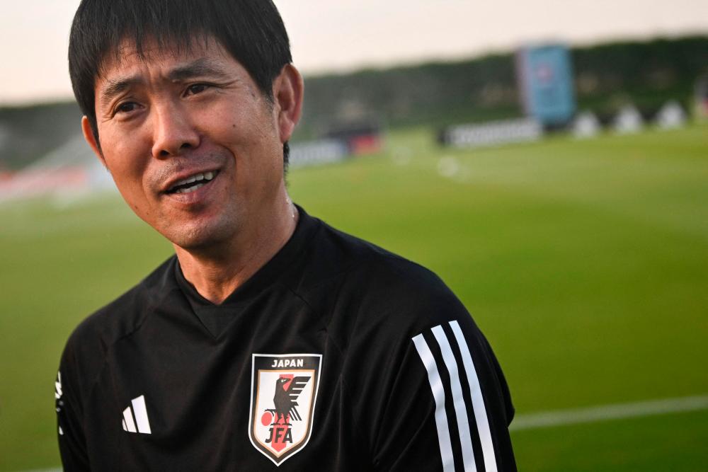 Japan’s coach Hajime Moriyasu oversees a training session at the Al Sadd SC training grounds in Doha on November 24, 2022, during the Qatar 2022 World Cup football tournament. AFPPIX