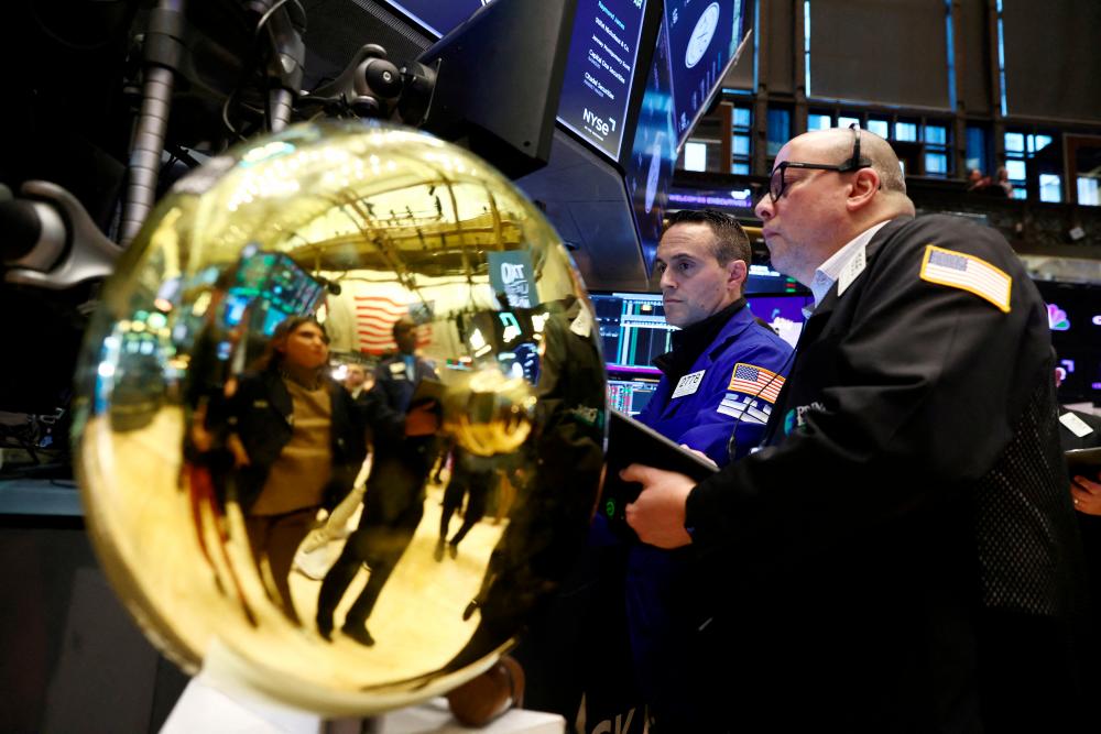 Traders working on the trading floor at the New York Stock Exchange. – Reuterspic