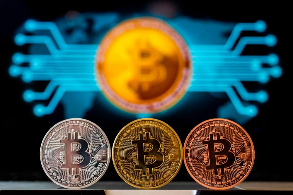 Bitcoin began to slide at the same time as stocks in technology companies, but the collapse has been more marked in the volatile crypto sector. AFPPIX