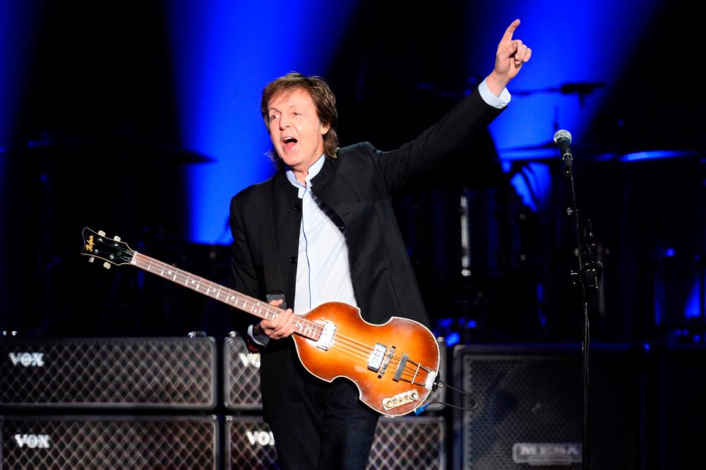 This file photo taken on May 30, 2016 shows British musician and former Beatles’ member Paul McCartney performs on stage at the Bercy stadium in Paris/AFPPix