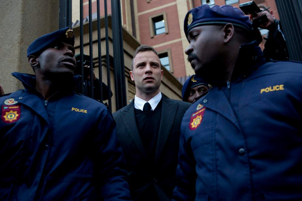 In this file photo taken on June 14, 2016 South African Paralympian Oscar Pistorius leaves the Pretoria High Court, on the second day of his pre sentencing hearing set to send him back to jail for murdering his girlfriend. AFPPIX