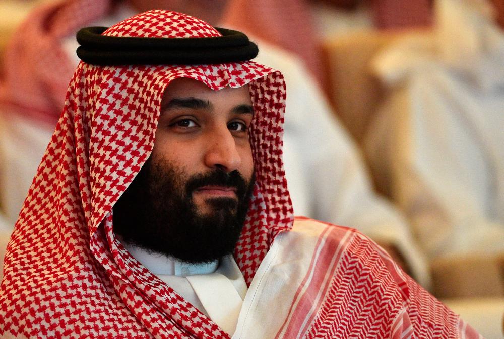 Putera Mahkota Saudi Mohammed bin Salman sedang hadir di majlis persidangan Future Investment Initiative (FII) dalam ibu kota Saudi, Riyadh pada 23 Oktober 2018 - AFP
