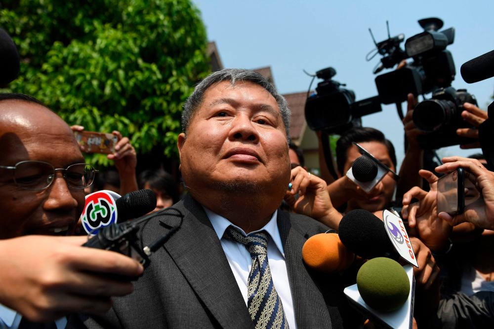 (FILES) In this file photo taken on March 19, 2019 Premchai Karnasuta leaves the court after hearing a verdict against himself and three other suspects in a poaching case at Thong Pha Phum Provincial Court in Kanchanaburi province. A Thai tycoon accused of poaching wildlife in a national park lost his final appeal December 8, 2021, a rare conviction in a long running saga that drew public outrage over perceived impunity. AFPpix