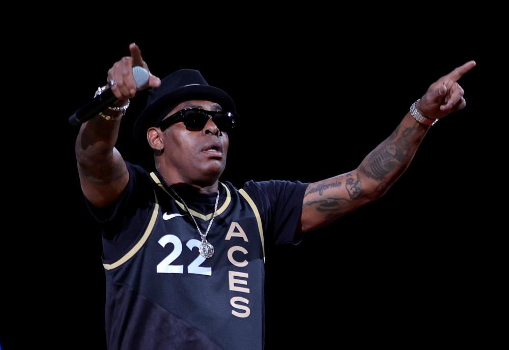 (FILES) In this file photo taken on May 31, 2022 rapper/actor Coolio performs at halftime of a game between the Connecticut Sun and the Las Vegas Aces at Michelob ULTRA Arena in Las Vegas, Nevada. - AFPPIX