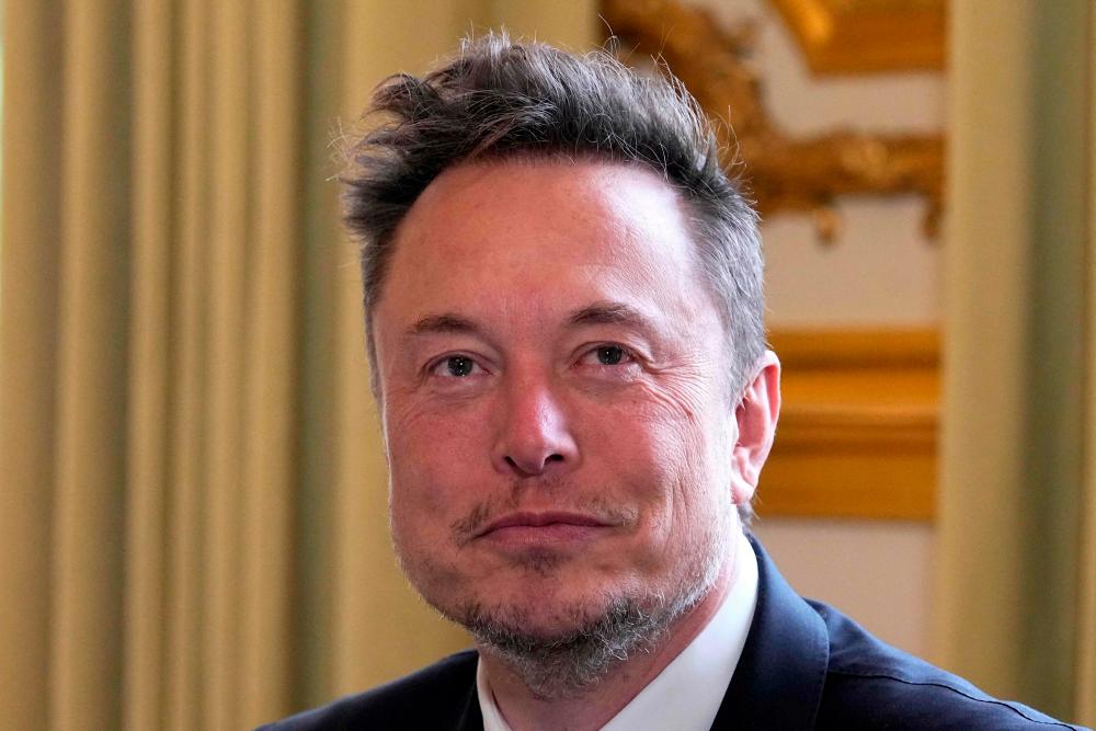 SpaceX, Twitter and electric car maker Tesla CEO Elon Musk meets with France’s President at the Elysee presidential palace in Paris on May 15, 2023. Elon Musk’s start-up Neuralink on May 25, 2023 said it has gotten approval from US regulators to test its brain implants in people/AFPPix