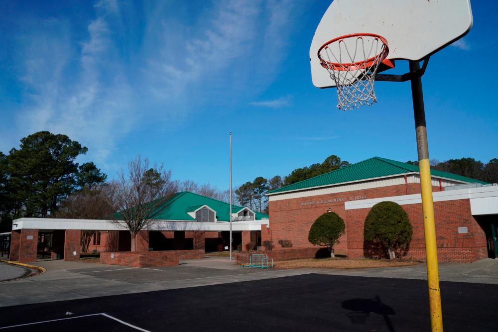 (FILES) In this file photo taken on January 7, 2023, an empty basketball court is seen outside Richneck Elementary School in Newport News, Virginia. AFPPIX