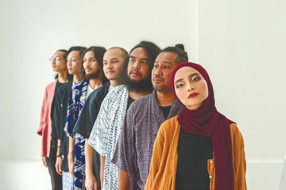 $!Wani posing with her band. – by Adi Wafi of Adore White Films