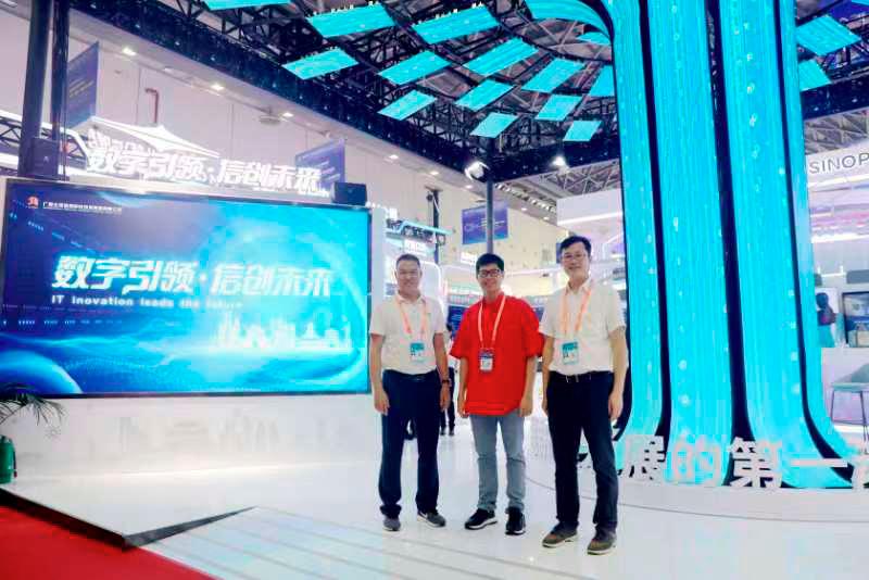 Wong (centre) with Lai (left) and GM of Guangxi Beitou IT Innovation Technology Investment Group Co Ltd Chen Qing at the service demonstration during the 20th China-ASEAN Expo in Nanning, Guangxi Zhuang Autonomous Region of China.