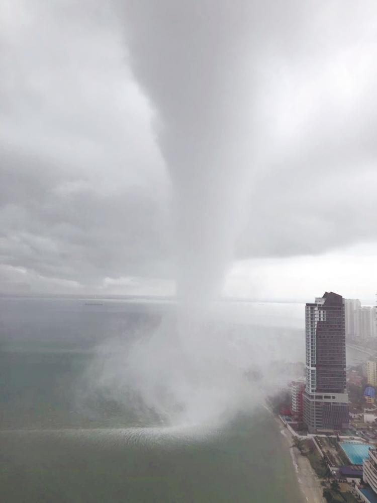 A picture obtained via social media showing a waterspout near Penang Island.