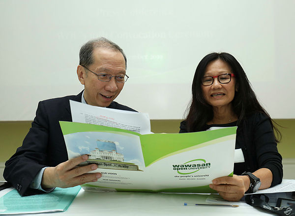 Wawasan Open University Board of Governors Chairman, Tan Sri Koh Tsu Koon (left) together with Chief Executive and Vice Chancellor, Professor Lily Chan at a press conference today. — Sunpix by Masry Che Ani