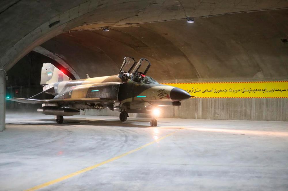 Iran unveils underground base for fighter jets