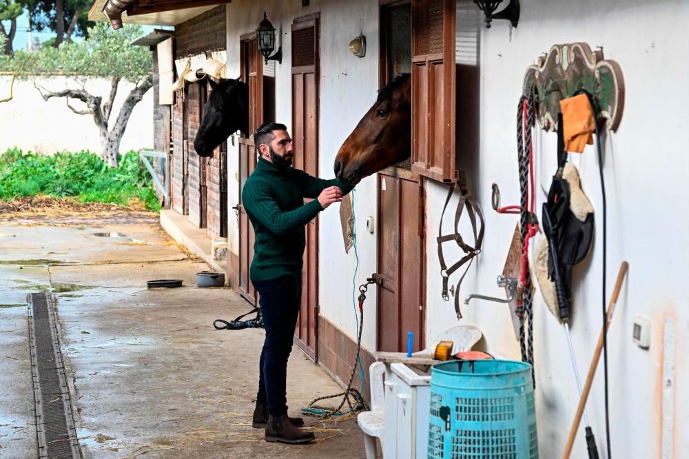 Anti-mafia activist Giuseppe Cimarosa, who is related to arrested mafia boss Matteo Messina Denaro trough his mother, is pictured at his stud farm in Castelvetrano, Sicily, on January 20, 2023. AFPPIX