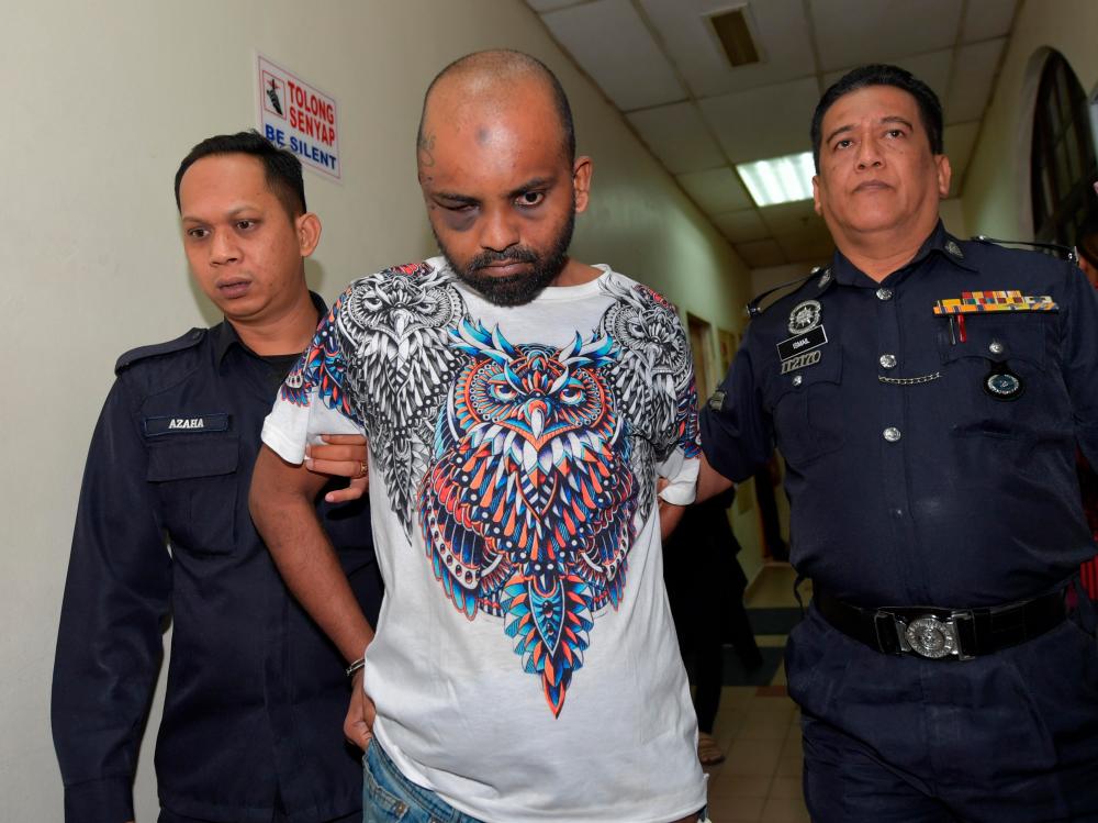 The magistrates’ court today ordered Mohd Zulkifli Ali, 33, who allegedly stepped on the Quran in a viral video to be sent to Permai Hospital for mental health examination. - Bernama