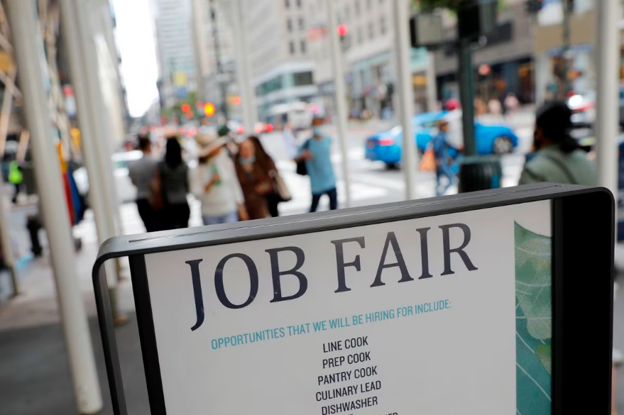 Signage for a job fair is seen on 5th Avenue after the release of the jobs report in Manhattan, New York City, U.S., September 3, 2021. REUTERSPIX