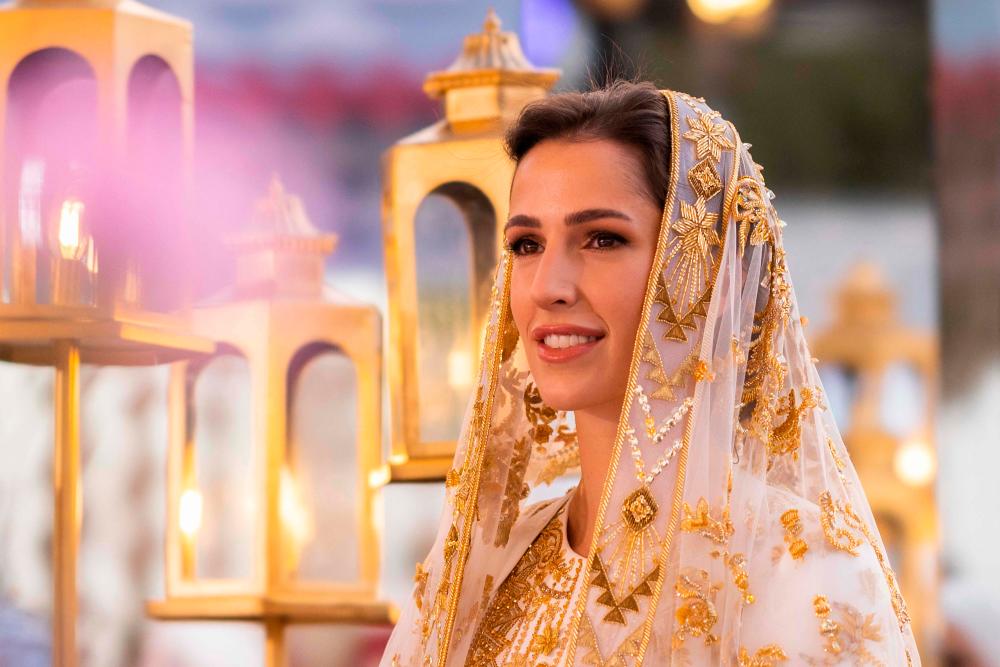 A handout picture released by the Press Service of Jordanian Queen Rania, shows Saudi fiancée Rajwa al-Saif during a pre-wedding dinner party in Amman on May 22, 2023/AFPPix