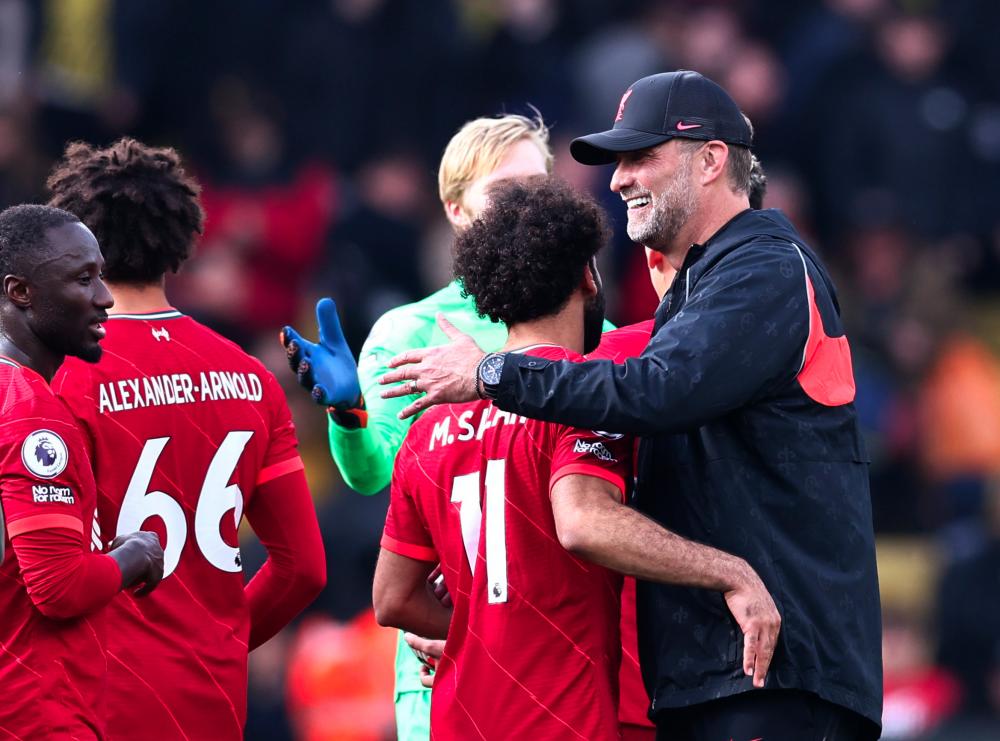 Liverpool manager Juergen Klopp with Mohamed Salah. Action Images via Reuterspix