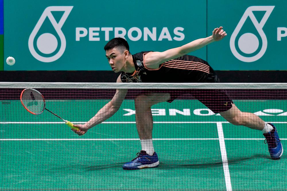 Men’s single Lee Zii Jia of Malaysia battling against his opponent Shesar Hiren Rhustavito of Indonesia in second round of the 2022 Petronas Malaysia Open Badminton Championships at Axiata Arena Bukit Jalil today. BERNAMApix