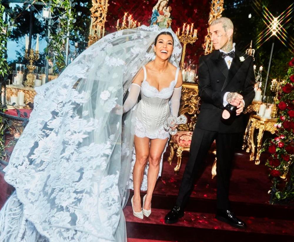 Kourtney Kardashian and Travis Barker after their nuptials. – Instagram