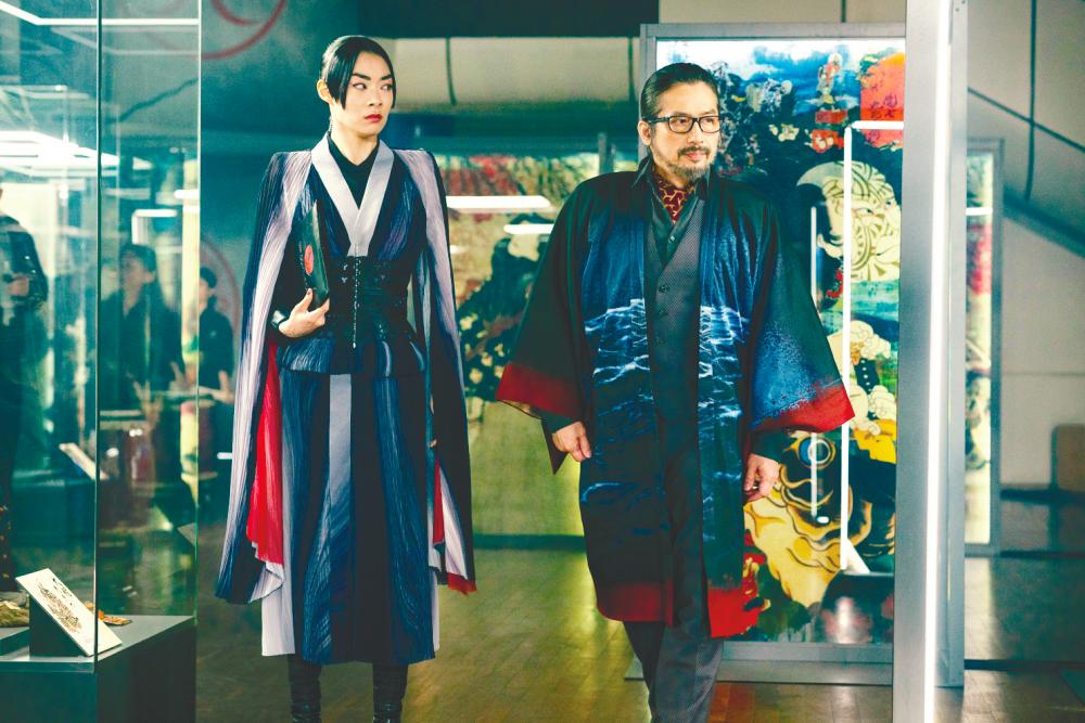 $!The film is seemingly setting up future spinoffs with its new characters, such as Akira (left).
